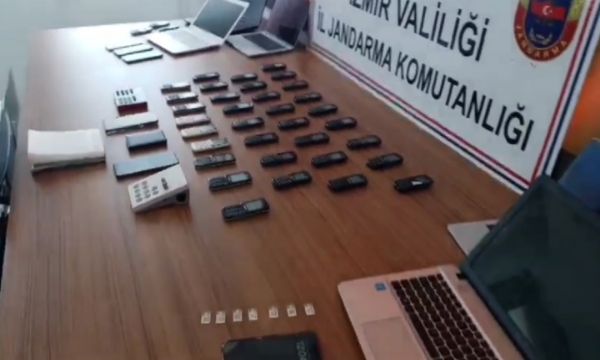 İzmir'de telefon dolandırıcılığı çetesine baskın!